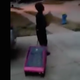 A young boy is seen in video walking down the sidewalk pulling his suitcase after his mother reportedly kicked him out for voting for Donald Trump in a mock school election.
YouTube screenshot